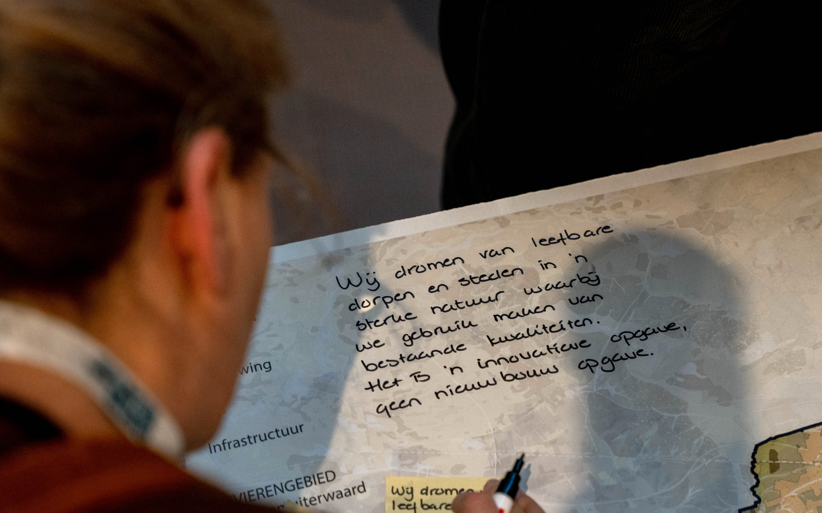 Congres Blik vooruit, bord met tekst: wij dromen van leefbare dorpen en steden in een sterke natuur waarbij we gebruik maken van bestaande kwaliteiten